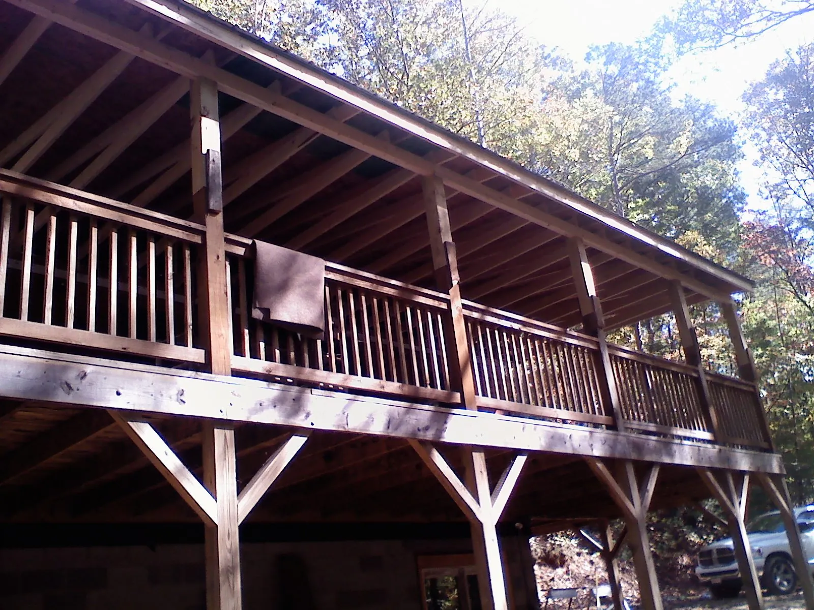 Timber framing under a new elevated porch and deck — Roof Leak Repair in Leipsic by Roofing Brothers